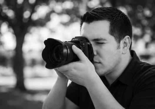 Eric photographing through a camera