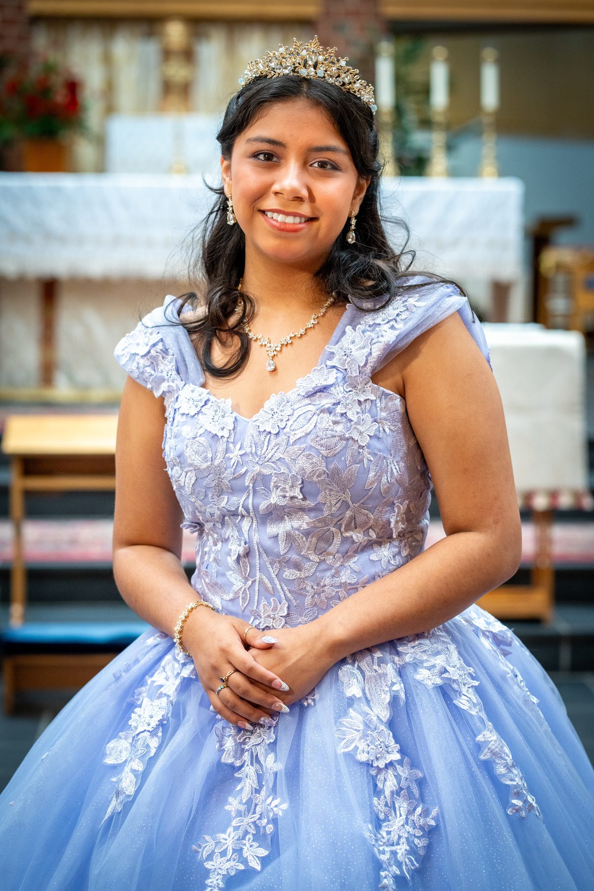 Quinceanera portrait in a blue dress