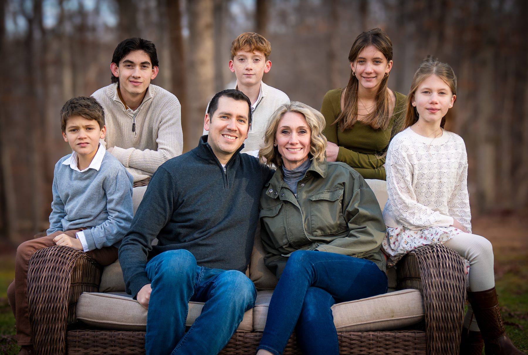 Family seated together outdoors