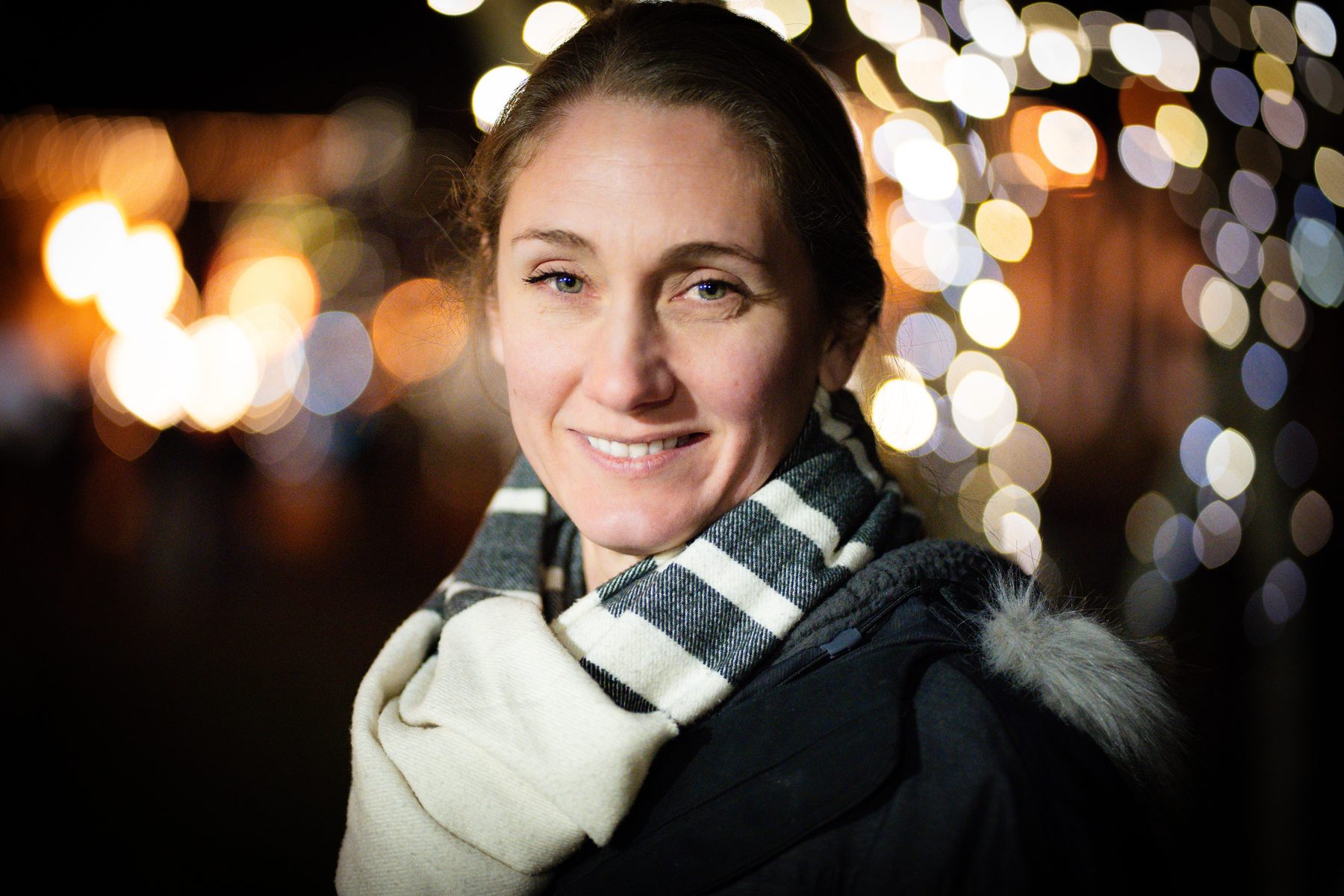 Outdoor night portrait with soft city lights